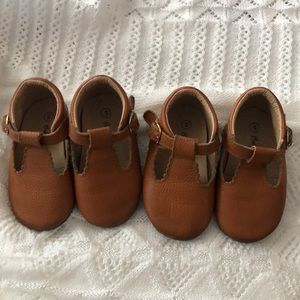 Two pairs of brown leather moccasins, size 5